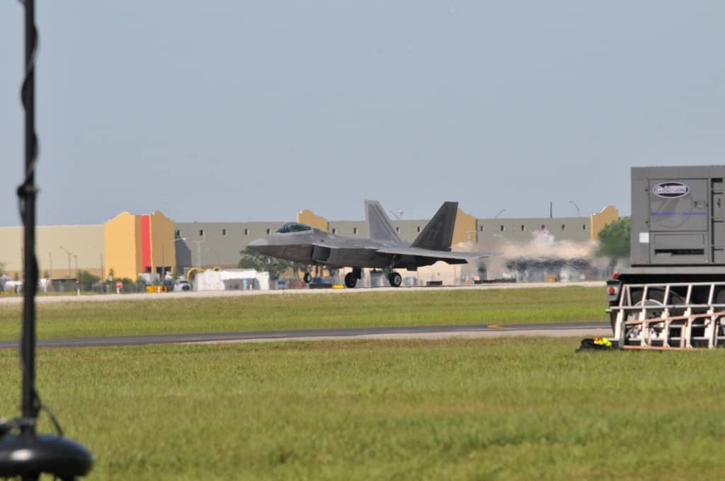 Sun n Fun Jet landing in front of Drane Field Road warehouse