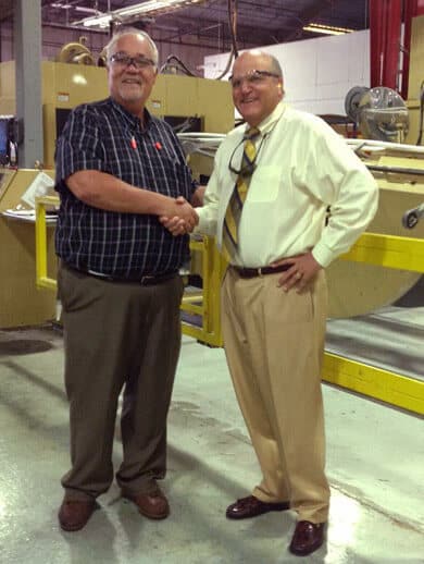 Greg Ruthven shaking hands with Steve Wasko