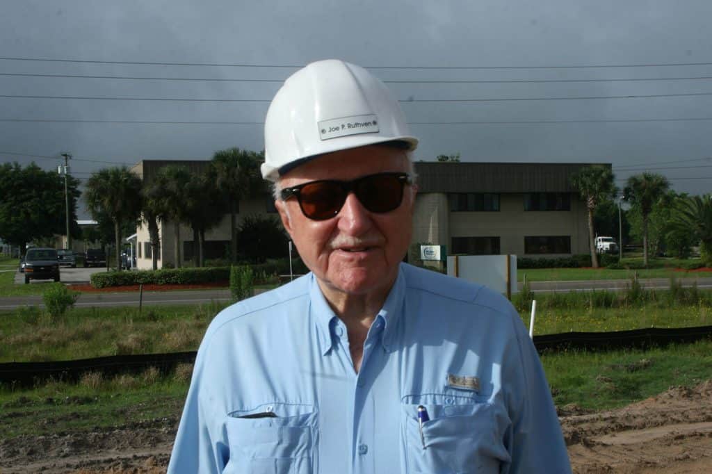 Joe Ruthven wearing a hard hat and sunglasses